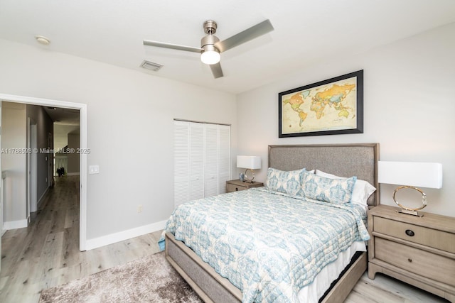 5134 W Madison Lakes Cir W, Davie, FL 33328 - bedroom featuring visible vents, baseboards, a closet, light wood finished floors, and a ceiling fan