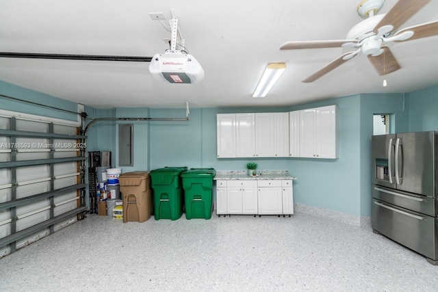 5134 W Madison Lakes Cir W, Davie, FL 33328 - garage featuring ceiling fan, a garage door opener, and stainless steel fridge with ice dispenser