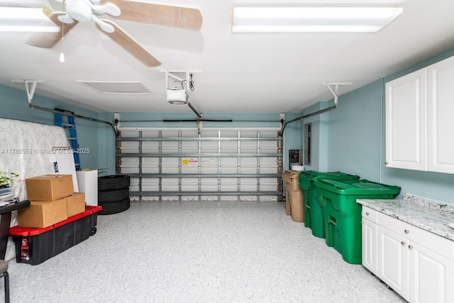 5134 W Madison Lakes Cir W, Davie, FL 33328 - garage with ceiling fan and a garage door opener