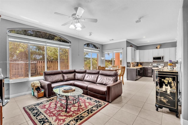 7738 NW 17th Pl, Pembroke Pines, FL 33024 - living room featuring light tile patterned floors, ceiling fan, crown molding, and recessed lighting