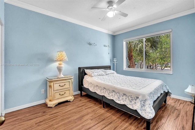 7738 NW 17th Pl, Pembroke Pines, FL 33024 - bedroom with wood finished floors, baseboards, crown molding, and ceiling fan