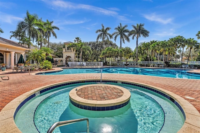 7738 NW 17th Pl, Pembroke Pines, FL 33024 - community pool with a patio