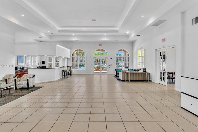 7738 NW 17th Pl, Pembroke Pines, FL 33024 - common area featuring a high ceiling and recessed lighting