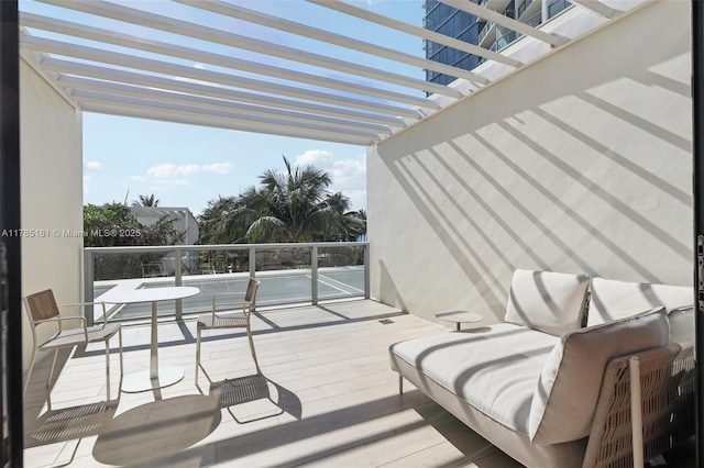 wooden terrace featuring a pergola