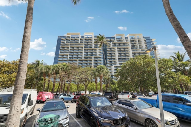 view of property with uncovered parking