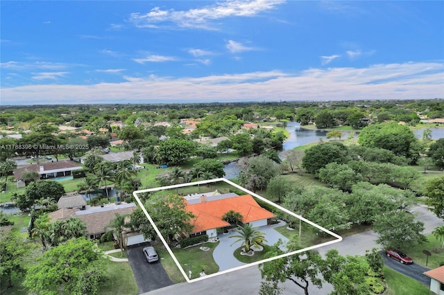 aerial view featuring a residential view and a water view