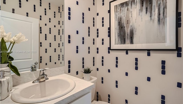 1472 NE 3rd Ave, Florida City, FL 33034 - bathroom featuring toilet and vanity