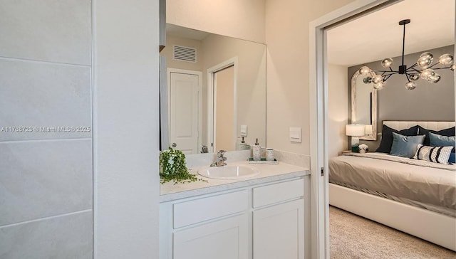 1472 NE 3rd Ave, Florida City, FL 33034 - interior space featuring an inviting chandelier, vanity, and visible vents