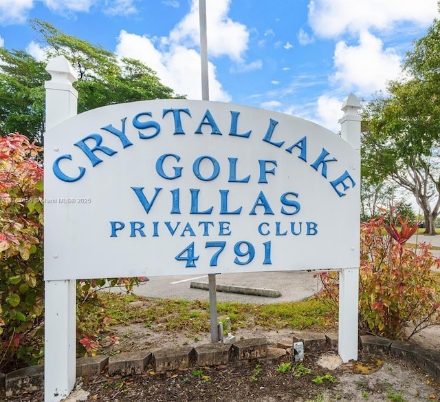 view of community sign