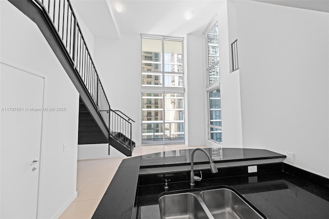 300 S Biscayne Blvd Unit L-802, Miami, FL 33131 - kitchen featuring a sink and dark countertops