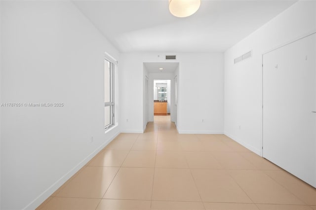300 S Biscayne Blvd Unit L-802, Miami, FL 33131 - empty room featuring baseboards and light tile patterned floors