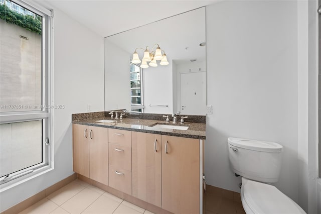 300 S Biscayne Blvd Unit L-802, Miami, FL 33131 - full bathroom featuring plenty of natural light, toilet, and tile patterned floors