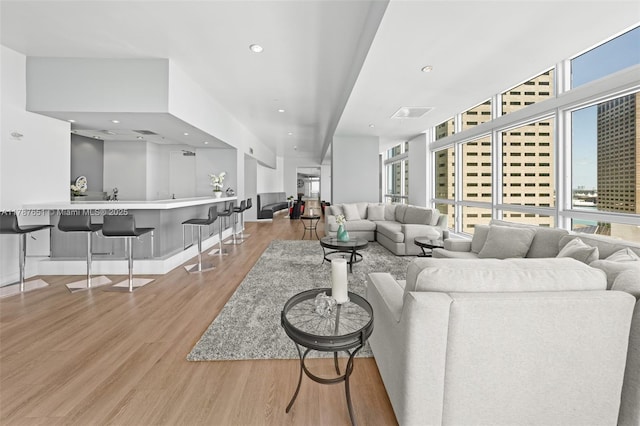 300 S Biscayne Blvd Unit L-802, Miami, FL 33131 - living area featuring wood finished floors and recessed lighting