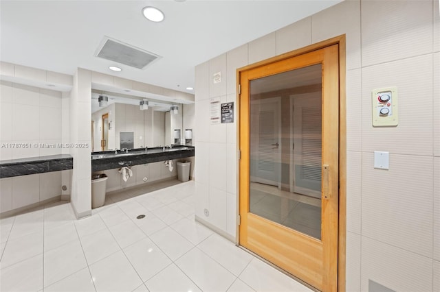 300 S Biscayne Blvd Unit L-802, Miami, FL 33131 - bathroom with tile walls, tile patterned floors, and recessed lighting