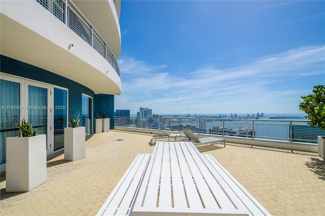 60 SW 13th St Unit 2609, Miami, FL 33130 - view of patio / terrace with a view of city and a water view