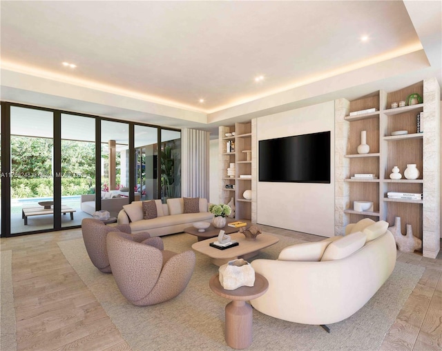 7840 SW 98th St, Miami, FL 33156 - living area featuring recessed lighting, wood finished floors, built in shelves, and a raised ceiling