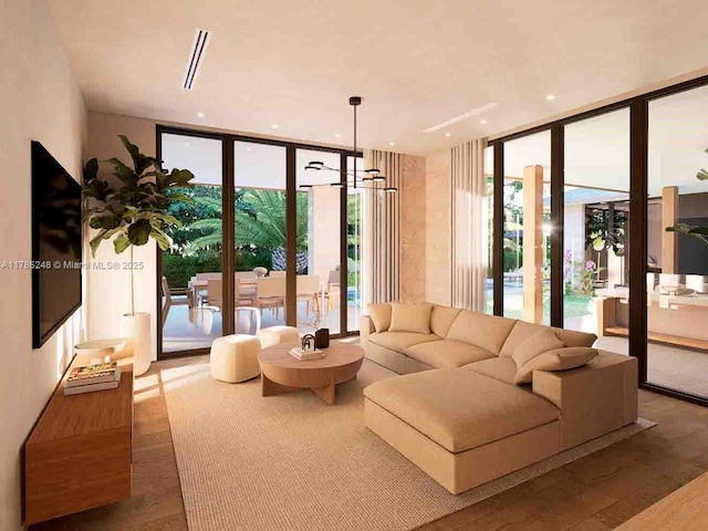 7840 SW 98th St, Miami, FL 33156 - living area featuring a wall of windows, wood finished floors, and visible vents
