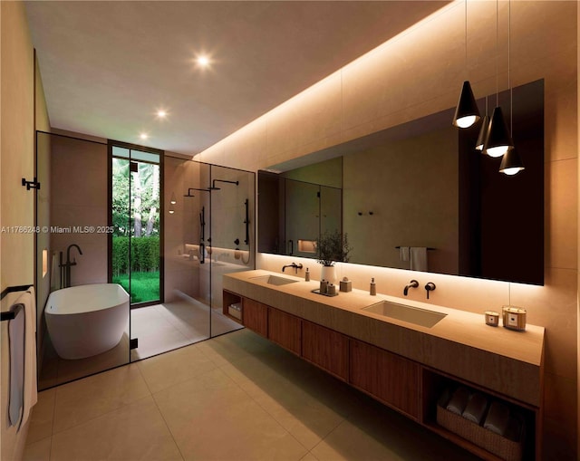 7840 SW 98th St, Miami, FL 33156 - bathroom featuring double vanity, a soaking tub, a stall shower, and a sink