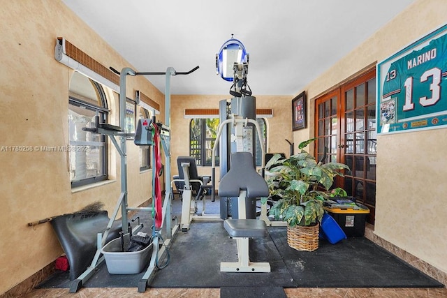 workout area featuring french doors