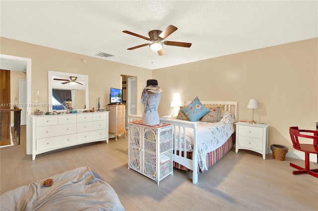 3904 Estepona Ave Unit 8D2, Doral, FL 33178 - bedroom with light wood-type flooring and ceiling fan