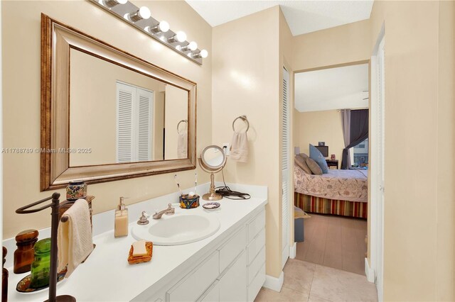 3904 Estepona Ave Unit 8D2, Doral, FL 33178 - ensuite bathroom with vanity and tile patterned floors