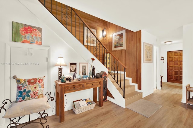 3904 Estepona Ave Unit 8D2, Doral, FL 33178 - stairway with wood finished floors, wooden walls, and baseboards