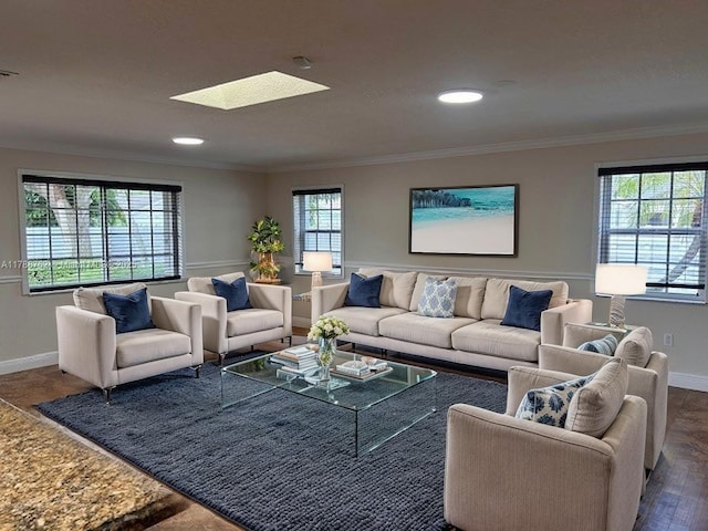 15242 SW 147th Ter, Miami, FL 33196 - living room with baseboards, a skylight, ornamental molding, dark wood-type flooring, and recessed lighting