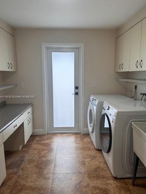 15242 SW 147th Ter, Miami, FL 33196 - laundry room with cabinet space, separate washer and dryer, and baseboards