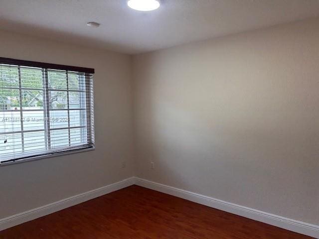 15242 SW 147th Ter, Miami, FL 33196 - unfurnished room featuring baseboards and wood finished floors