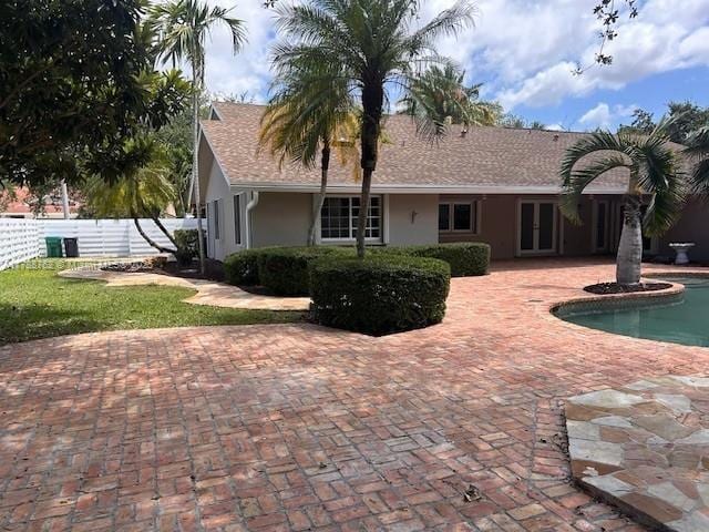 15242 SW 147th Ter, Miami, FL 33196 - view of pool with french doors, fence, and a patio area