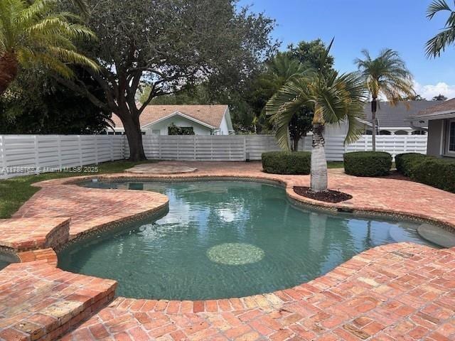 15242 SW 147th Ter, Miami, FL 33196 - view of pool featuring a fenced backyard and a patio area