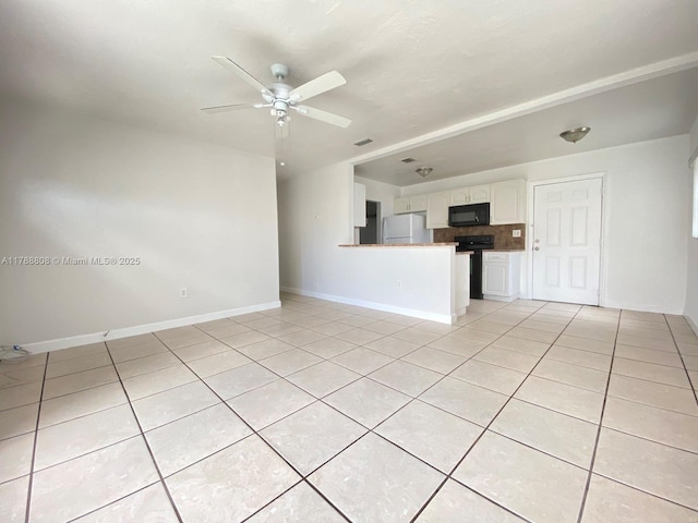 unfurnished living room with visible vents, ceiling fan, baseboards, and light tile patterned floors