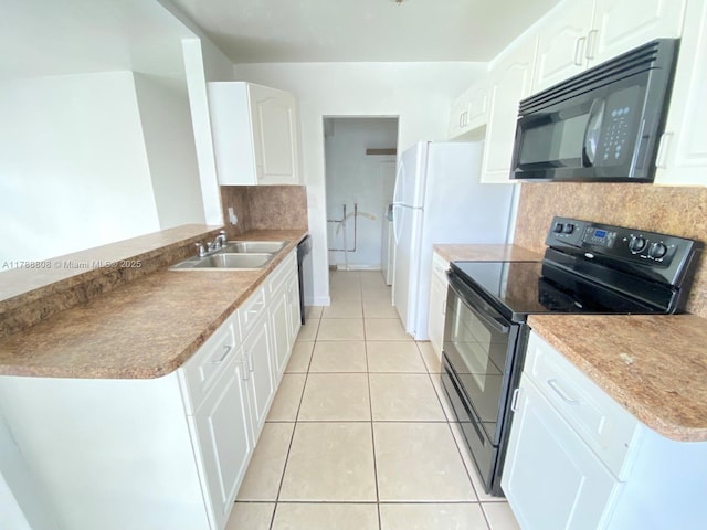 kitchen featuring black appliances, white cabinetry, a sink, and light tile patterned flooring