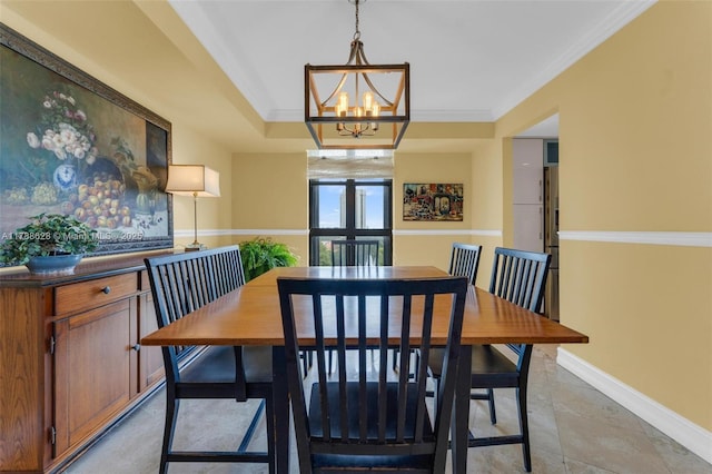 2000 Towerside Ter Unit 702, Miami, FL 33138 - dining area with crown molding, baseboards, and a notable chandelier