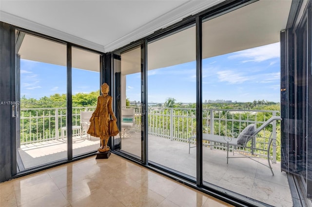 2000 Towerside Ter Unit 702, Miami, FL 33138 - doorway to outside with tile patterned flooring and a wall of windows
