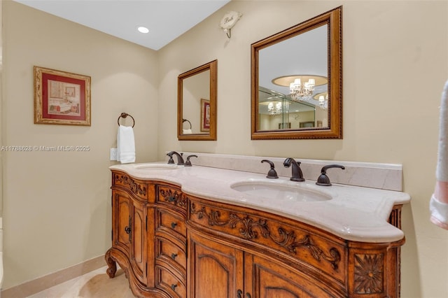 2000 Towerside Ter Unit 702, Miami, FL 33138 - bathroom with a sink, baseboards, and double vanity