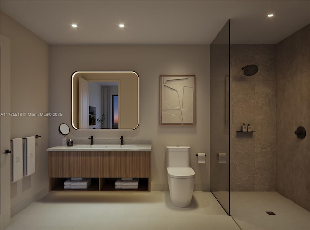 bathroom with toilet, vanity, a walk in shower, and recessed lighting