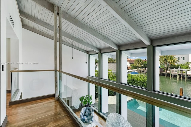 2055 NE 120th Rd, North Miami, FL 33181 - sunroom / solarium with beamed ceiling and a water view