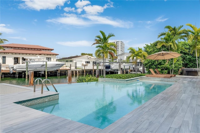 2055 NE 120th Rd, North Miami, FL 33181 - swimming pool featuring a dock, a water view, and boat lift