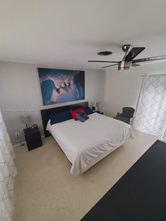 carpeted bedroom with a ceiling fan