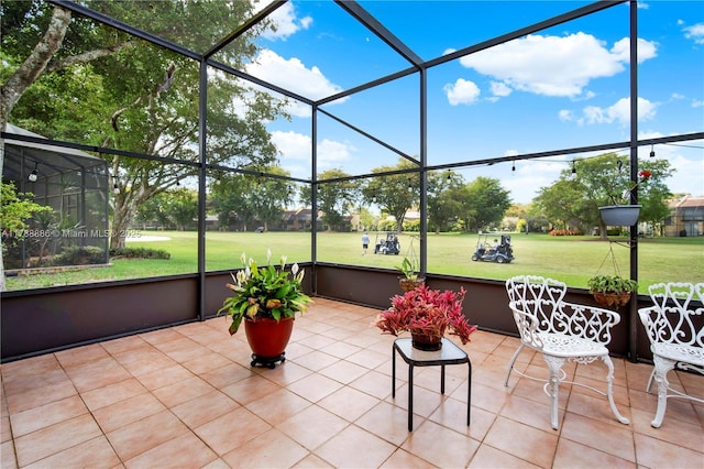 3939 Adra Ave Unit A-47, Doral, FL 33178 - sunroom / solarium featuring view of golf course