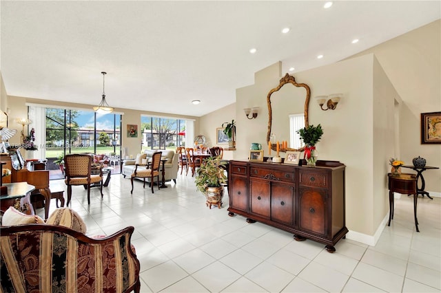 3939 Adra Ave Unit A-47, Doral, FL 33178 - living room with light tile patterned flooring, recessed lighting, and a healthy amount of sunlight