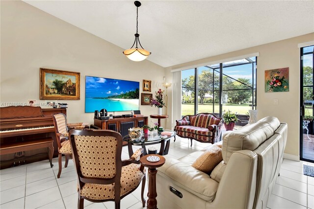 3939 Adra Ave Unit A-47, Doral, FL 33178 - living area featuring high vaulted ceiling and light tile patterned flooring