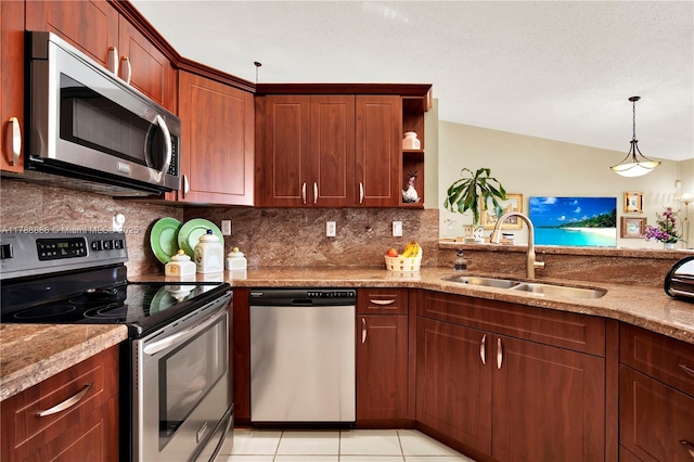 3939 Adra Ave Unit A-47, Doral, FL 33178 - kitchen featuring stainless steel appliances, a sink, light stone countertops, tasteful backsplash, and hanging light fixtures