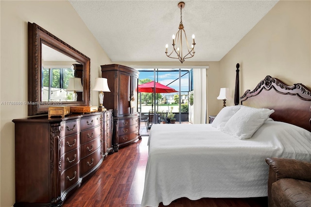 3939 Adra Ave Unit A-47, Doral, FL 33178 - bedroom featuring lofted ceiling, dark wood-type flooring, a textured ceiling, and a notable chandelier