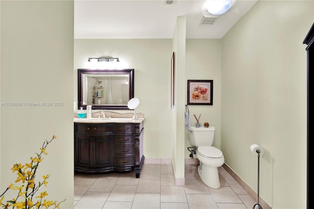 3939 Adra Ave Unit A-47, Doral, FL 33178 - bathroom with tile patterned floors, vanity, baseboards, toilet, and visible vents