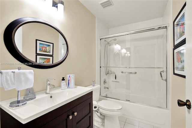 3939 Adra Ave Unit A-47, Doral, FL 33178 - bathroom with vanity, bath / shower combo with glass door, toilet, tile patterned flooring, and visible vents