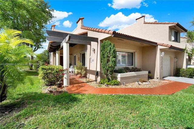 3939 Adra Ave Unit A-47, Doral, FL 33178 - rear view of house with stucco siding, driveway, a yard, and a tiled roof
