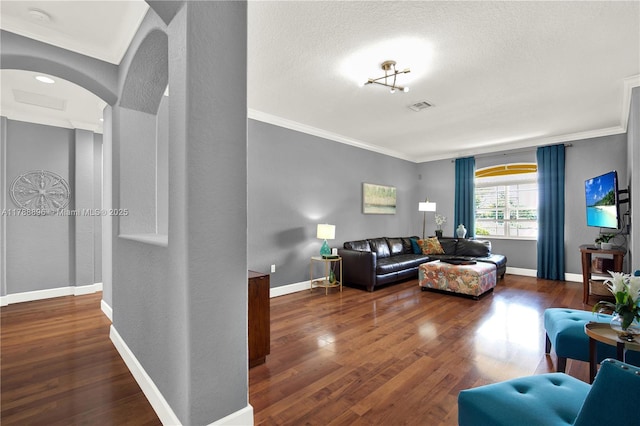 20656 SW 89th Ave, Cutler Bay, FL 33189 - living area with wood finished floors, crown molding, visible vents, and baseboards