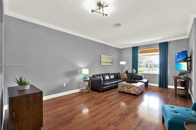 20656 SW 89th Ave, Cutler Bay, FL 33189 - living room featuring baseboards, visible vents, ornamental molding, and wood finished floors